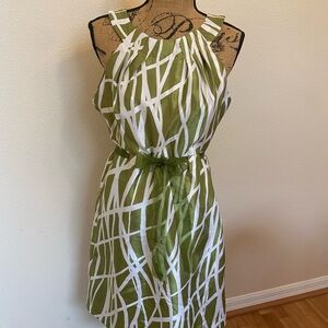 Olive green and white abstract striped dress with bow